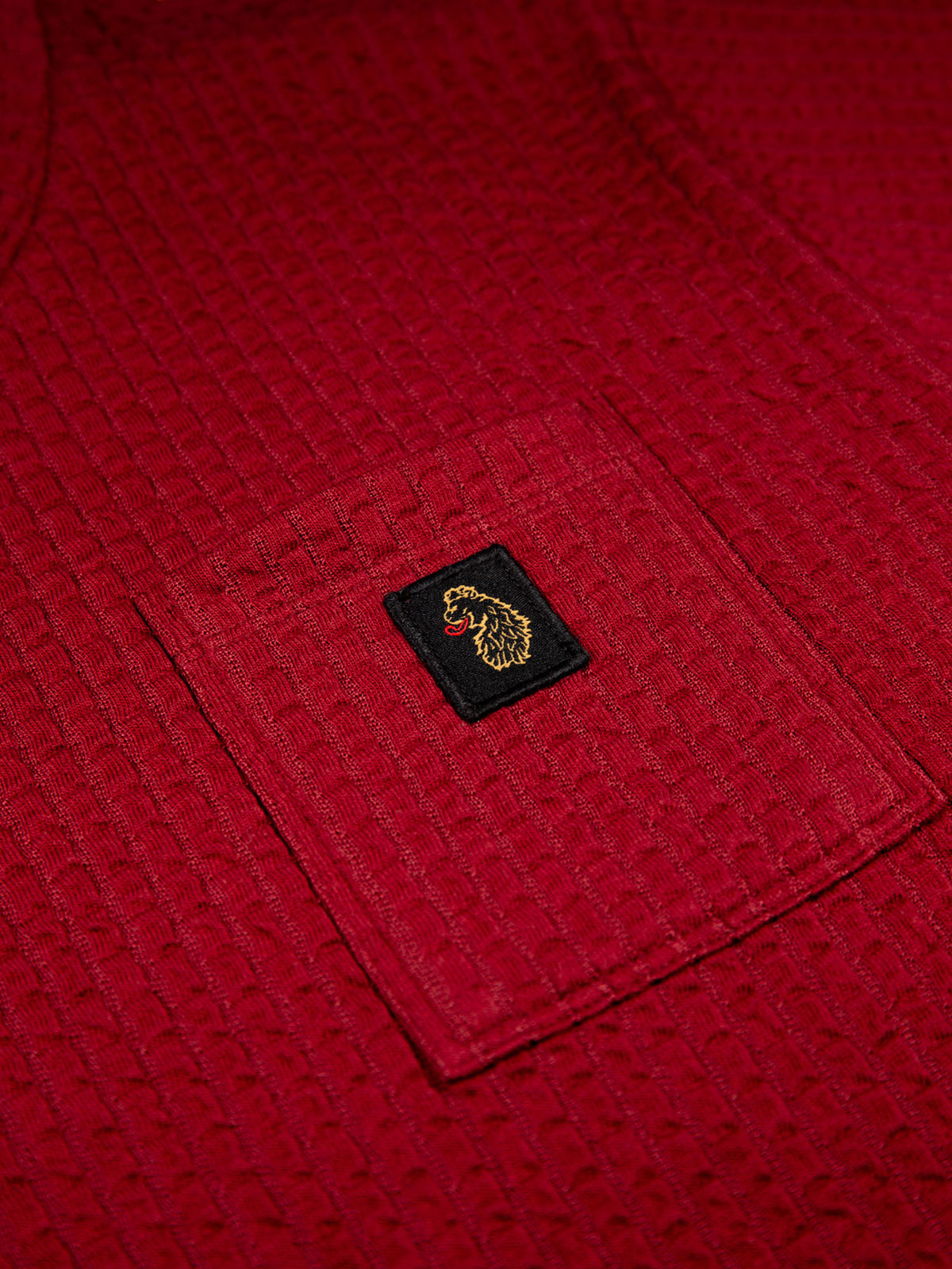 Men's red t-shirt with crew neck and short sleeves.