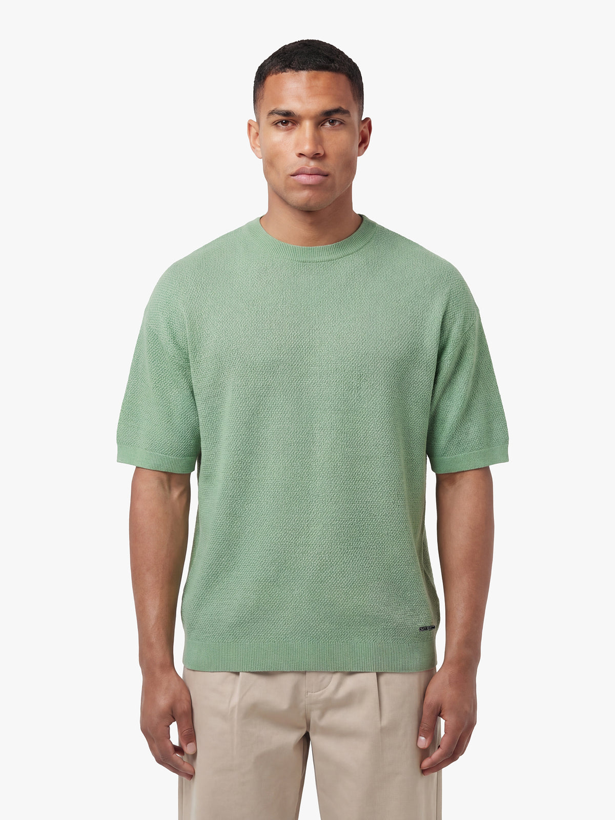 Men's relaxed-fit green t-shirt with crew neck and short sleeves, front view