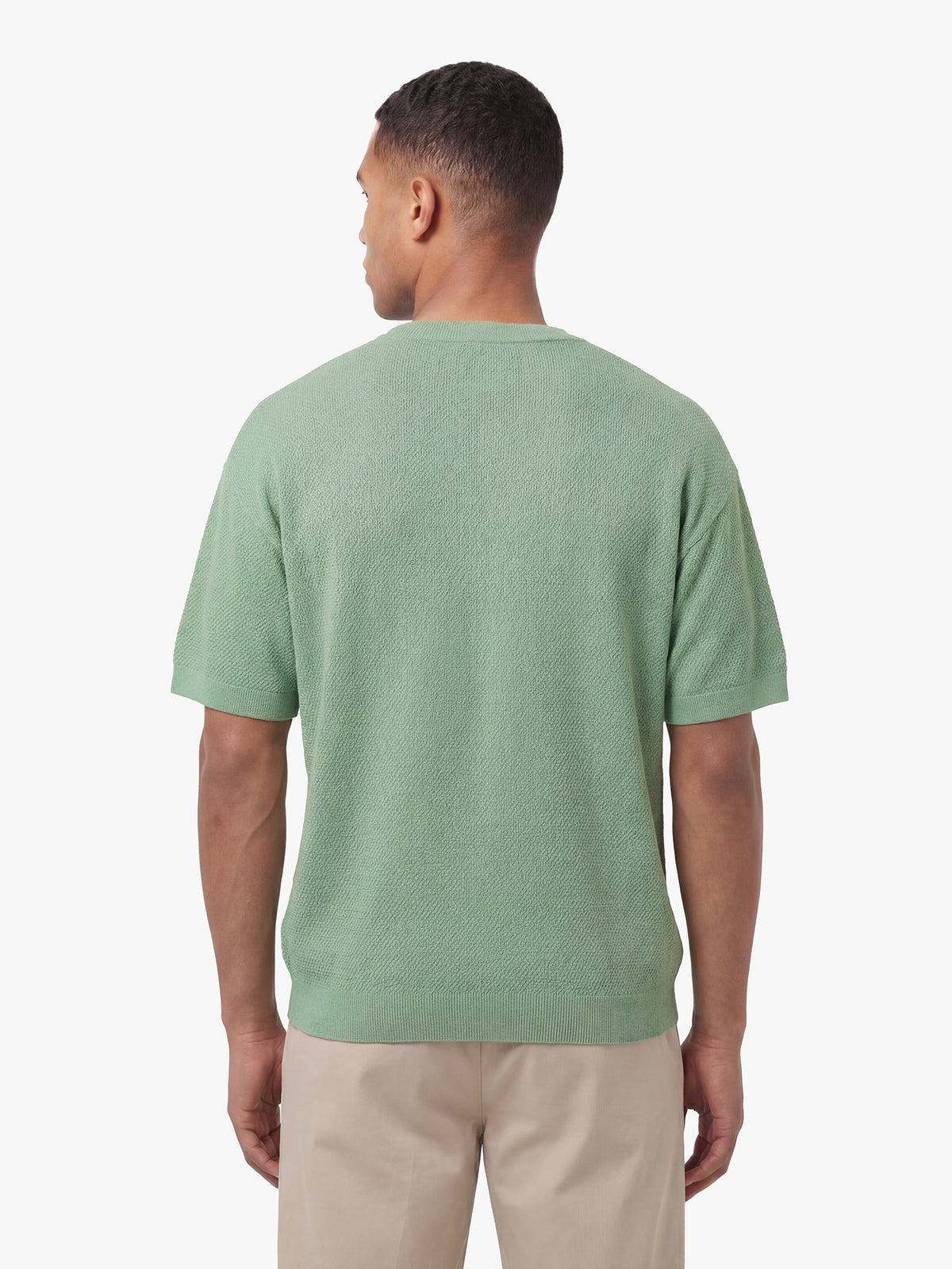 Men's relaxed-fit green t-shirt with crew neck and short sleeves, back view