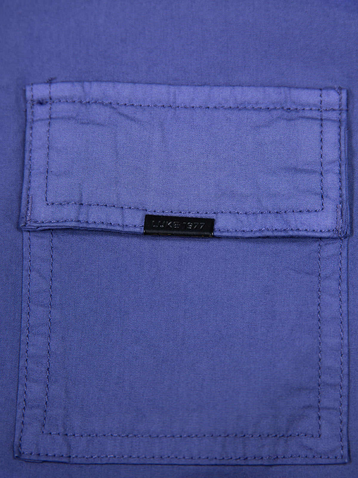 Men's purple shirt with button-up front.