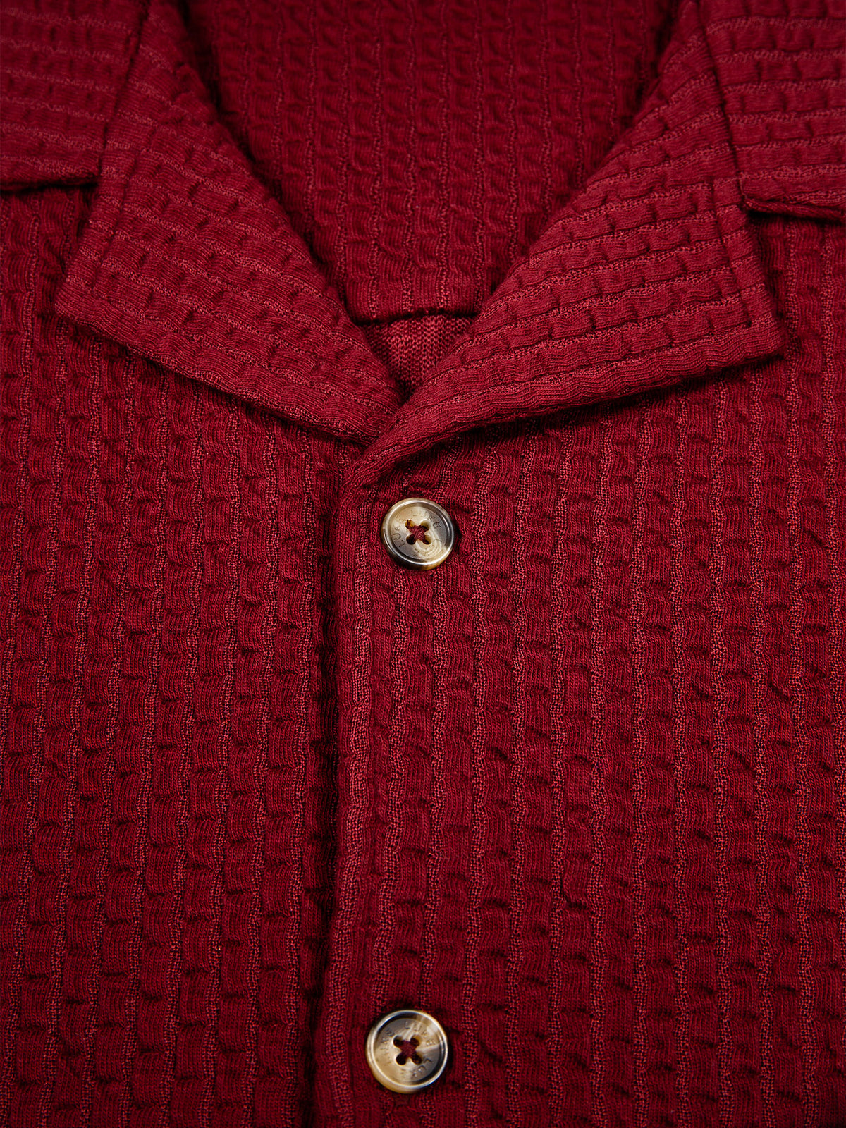 Men's red shirt with button-up front.