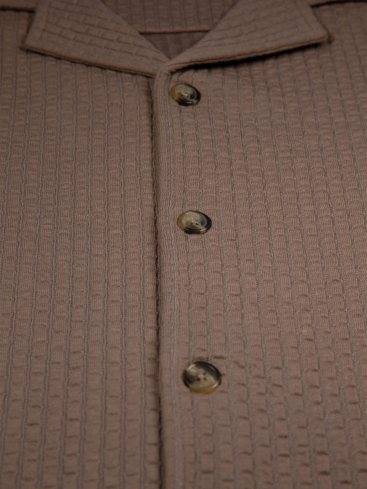 Men's brown shirt with button-up front.