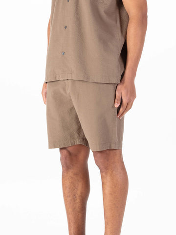 Men's brown shorts with drawstring waistband.
