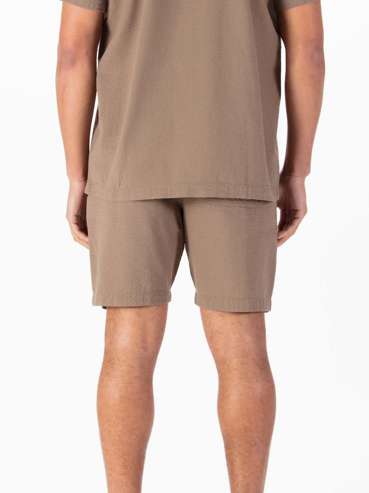 Men's brown shorts with drawstring waistband.