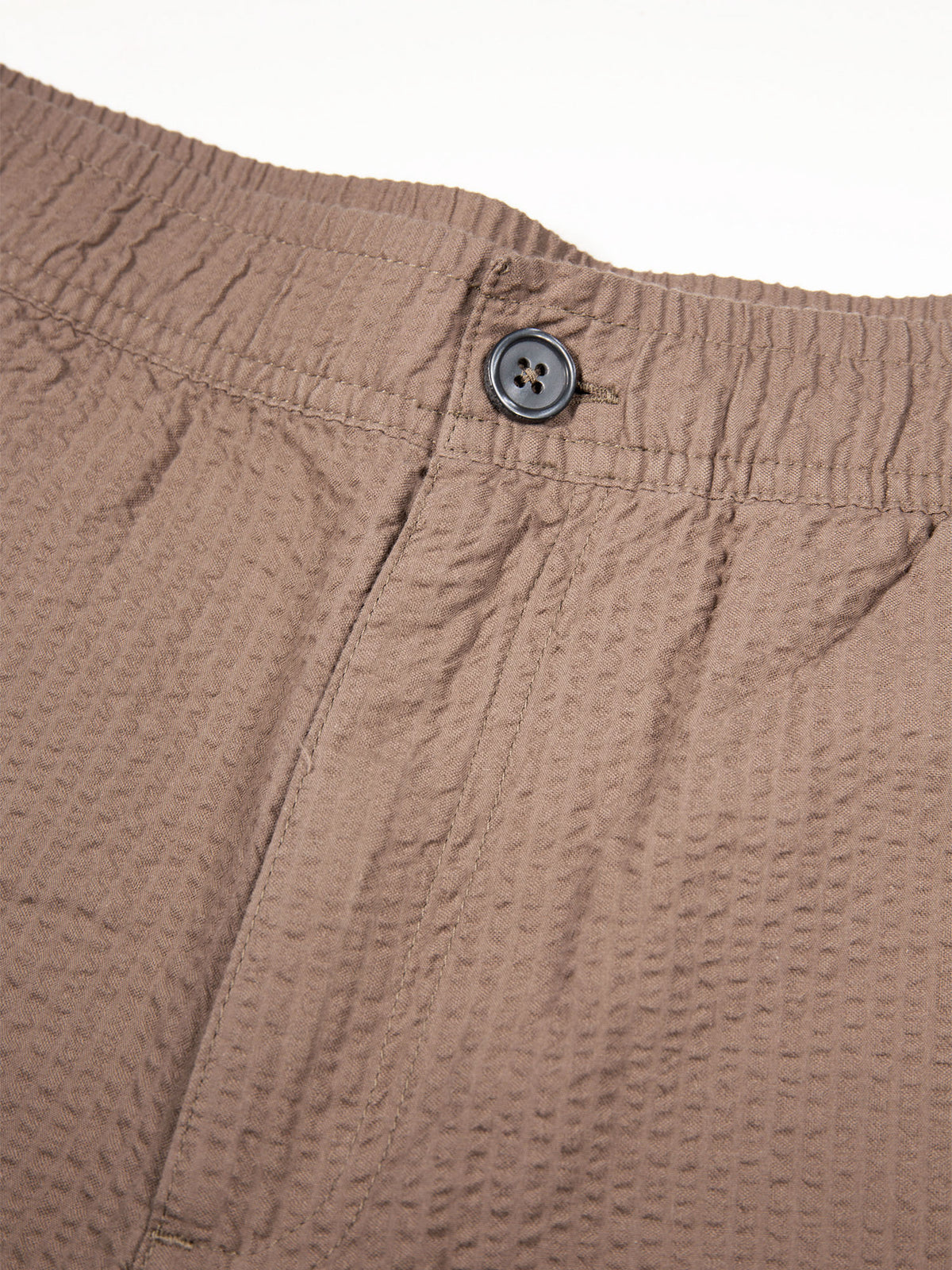 Men's brown shorts with drawstring waistband.