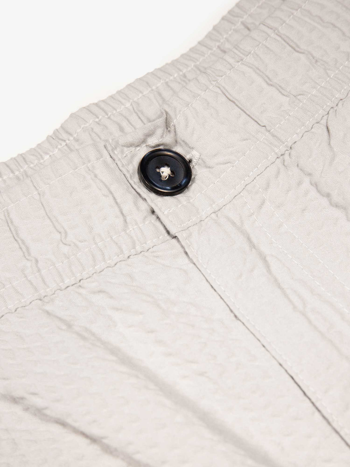 Men's grey shorts with drawstring waistband, detail view 1