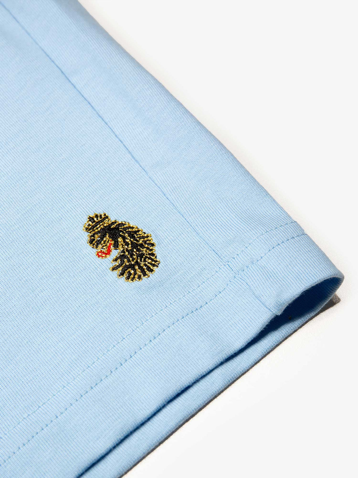 Men's blue-1 short set with short-sleeve shirt and drawstring shorts, detail view.