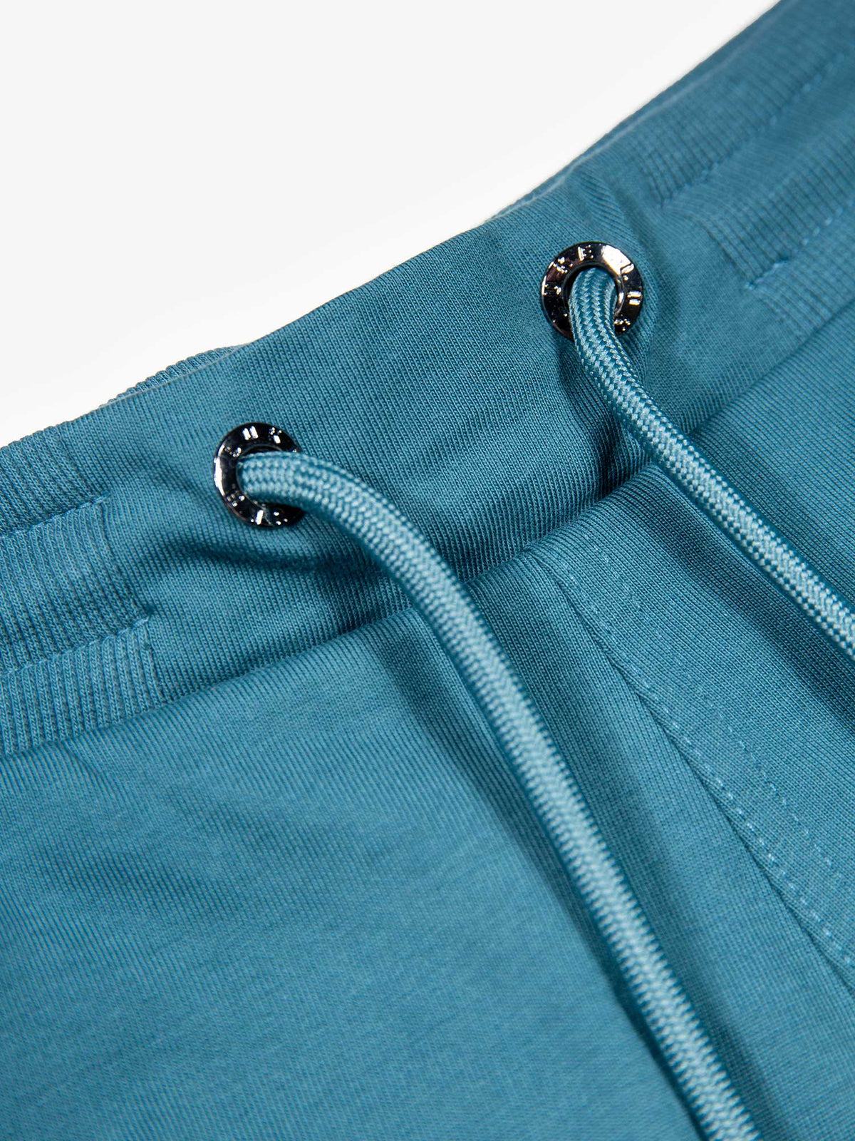 Men's blue short set with short-sleeve shirt and drawstring shorts, detail view.