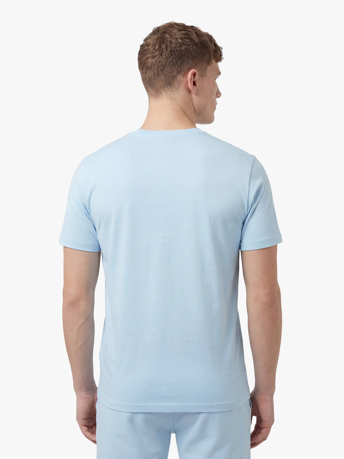Men's blue-1 short set with short-sleeve shirt and drawstring shorts, worn by a model, back view.