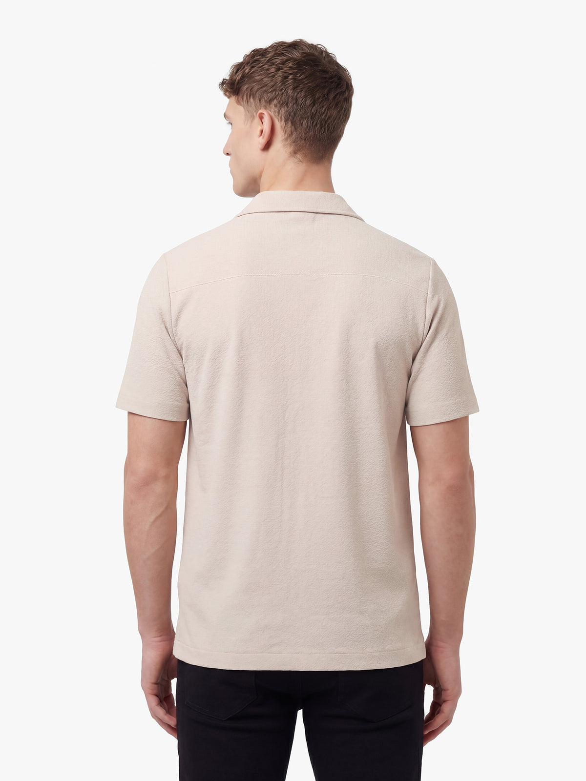 Men's beige shirt with Cuban collar and button-up front, back view