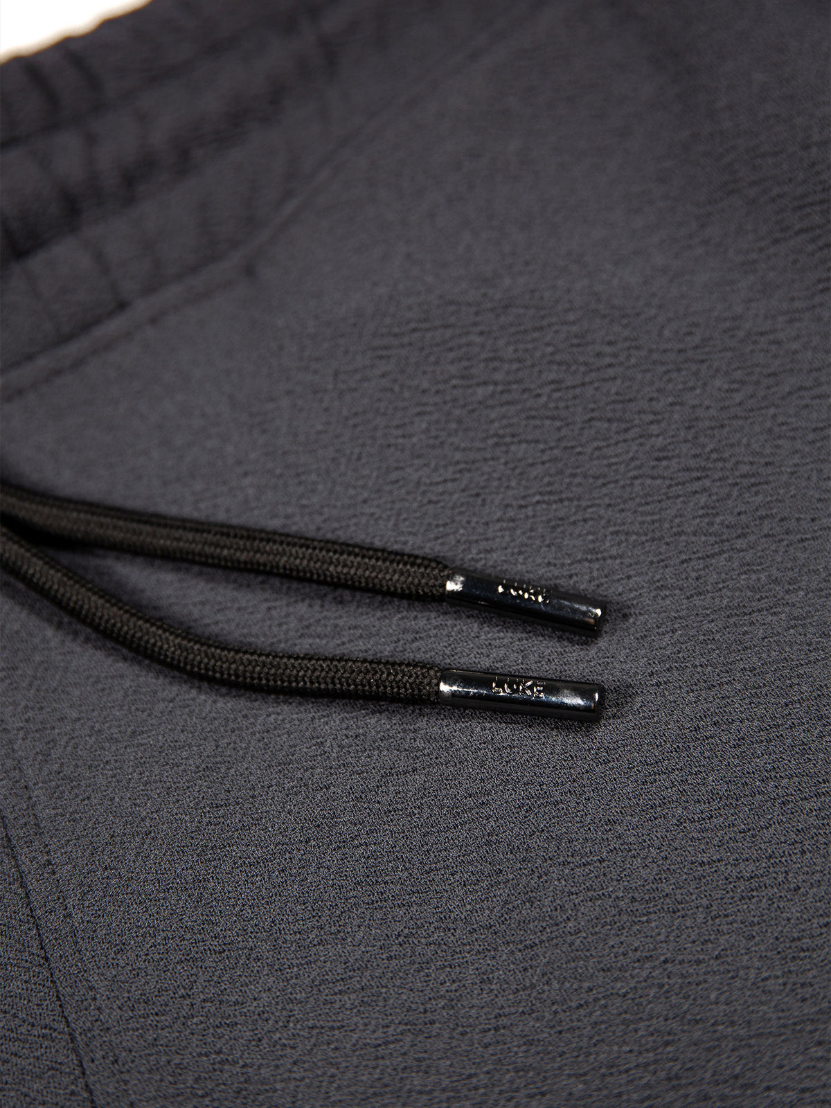 Men's grey shorts with drawstring waistband.