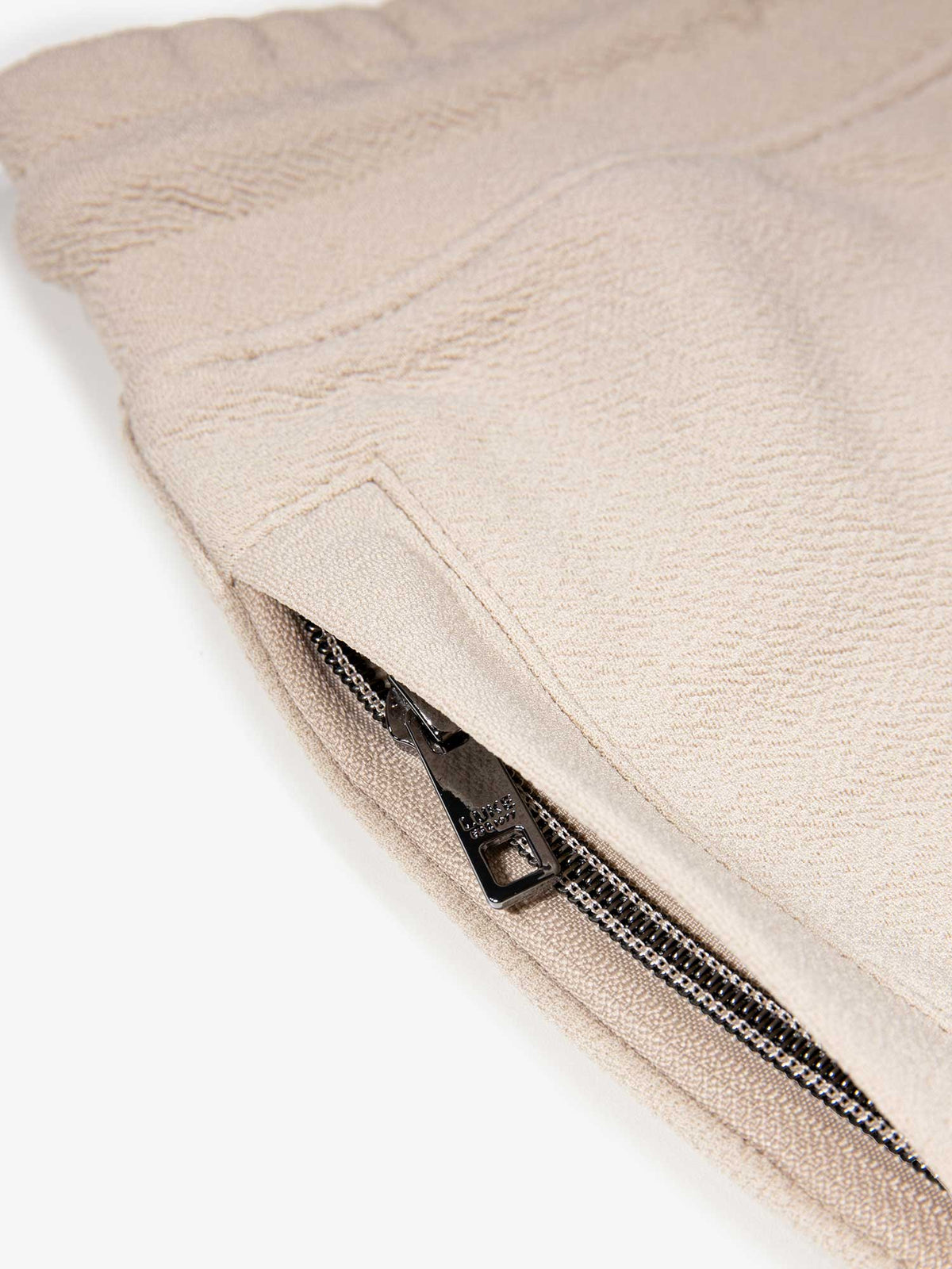 Men's beige shorts with drawstring waistband.