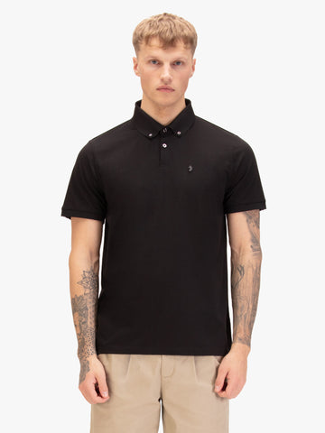 Men's black polo shirt with polo collar, worn by a model, front view