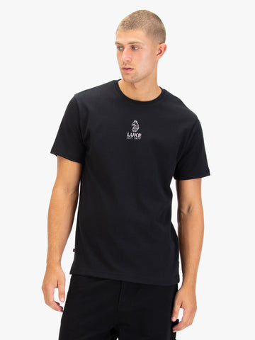 Men's black t-shirt with crew neck and short sleeves worn by a model - front view.