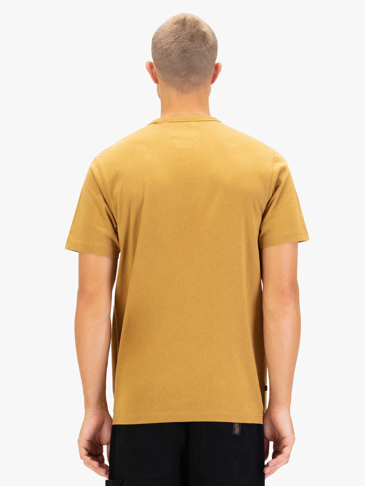 Men's yellow t-shirt with crew neck and short sleeves worn by a model - back view.
