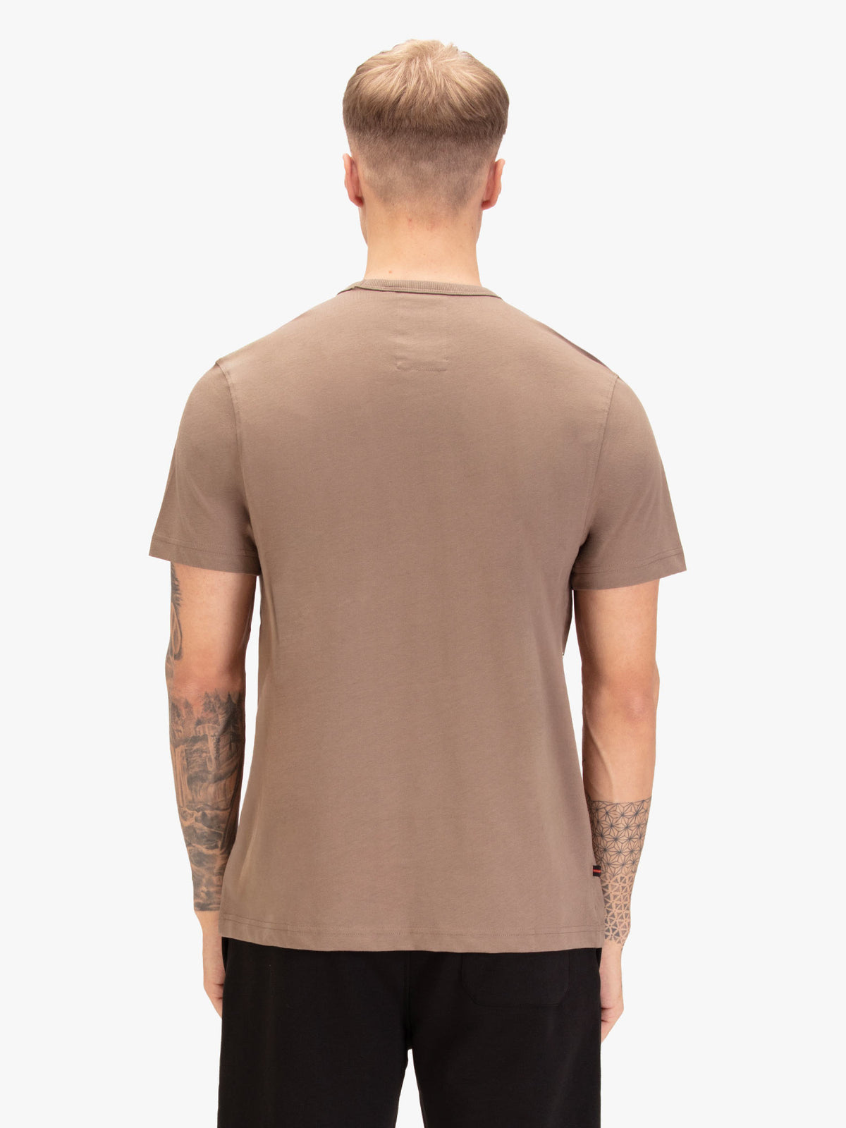 Men's brown t-shirt with crew neck and short sleeves, worn by a model, back view