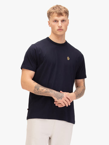 Man wearing navy LUKE 1977 Traffs 1000 pure cotton t-shirt, front view