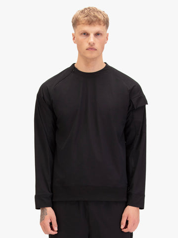 Men's black sweatshirt with crew neck, worn by a model, front view