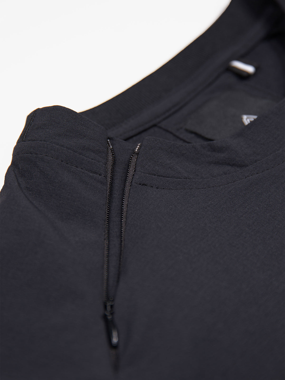Boy's black sweatshirt with concealed zip and sleeve pocket, zip detail view
