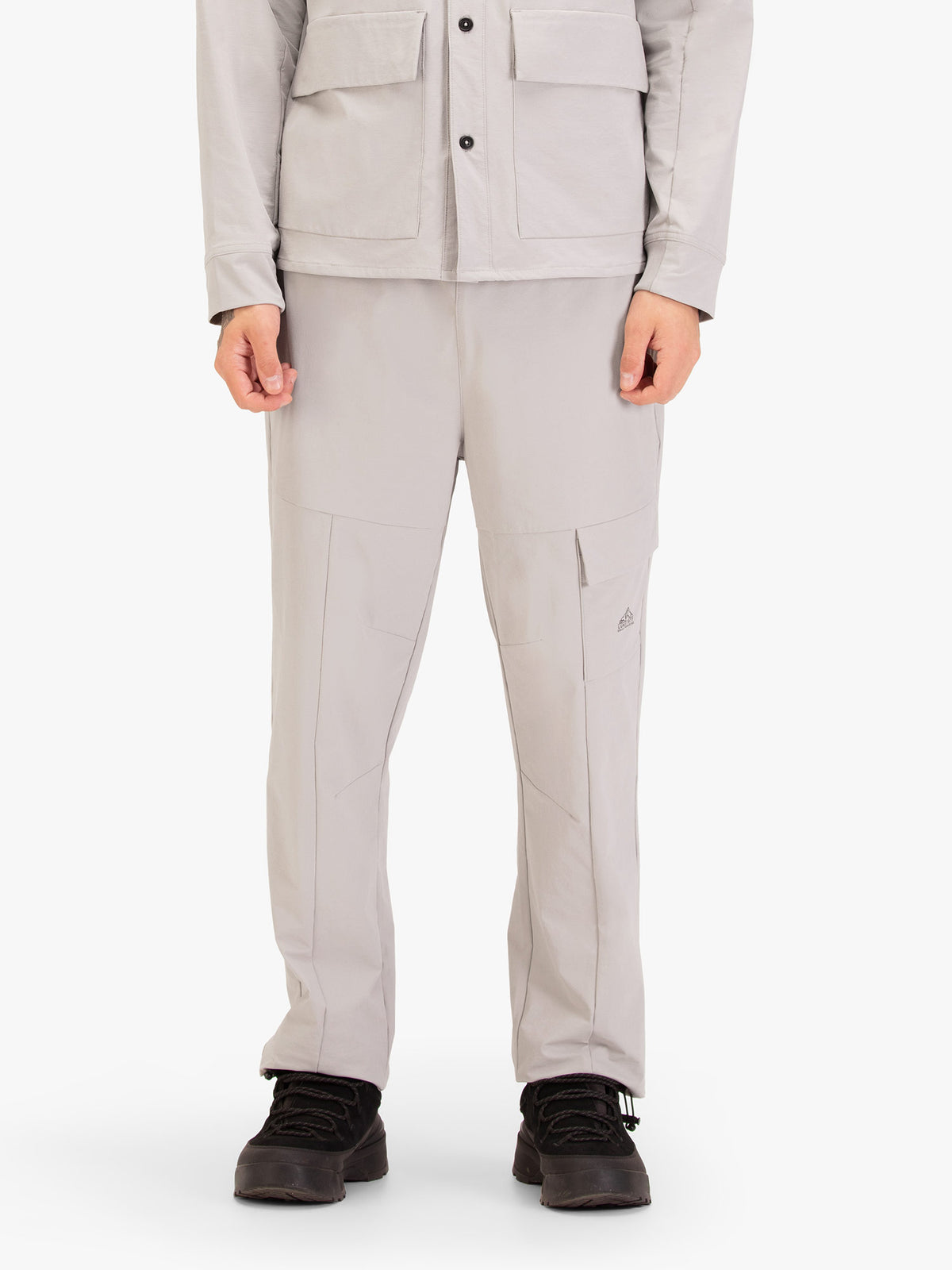 Men's grey joggers with elasticated waistband and cargo pockets.