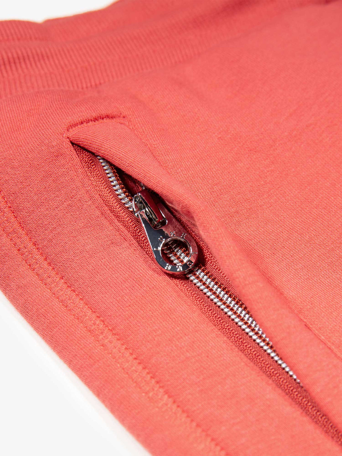 Men's red shorts with drawstring waistband, detail view 4