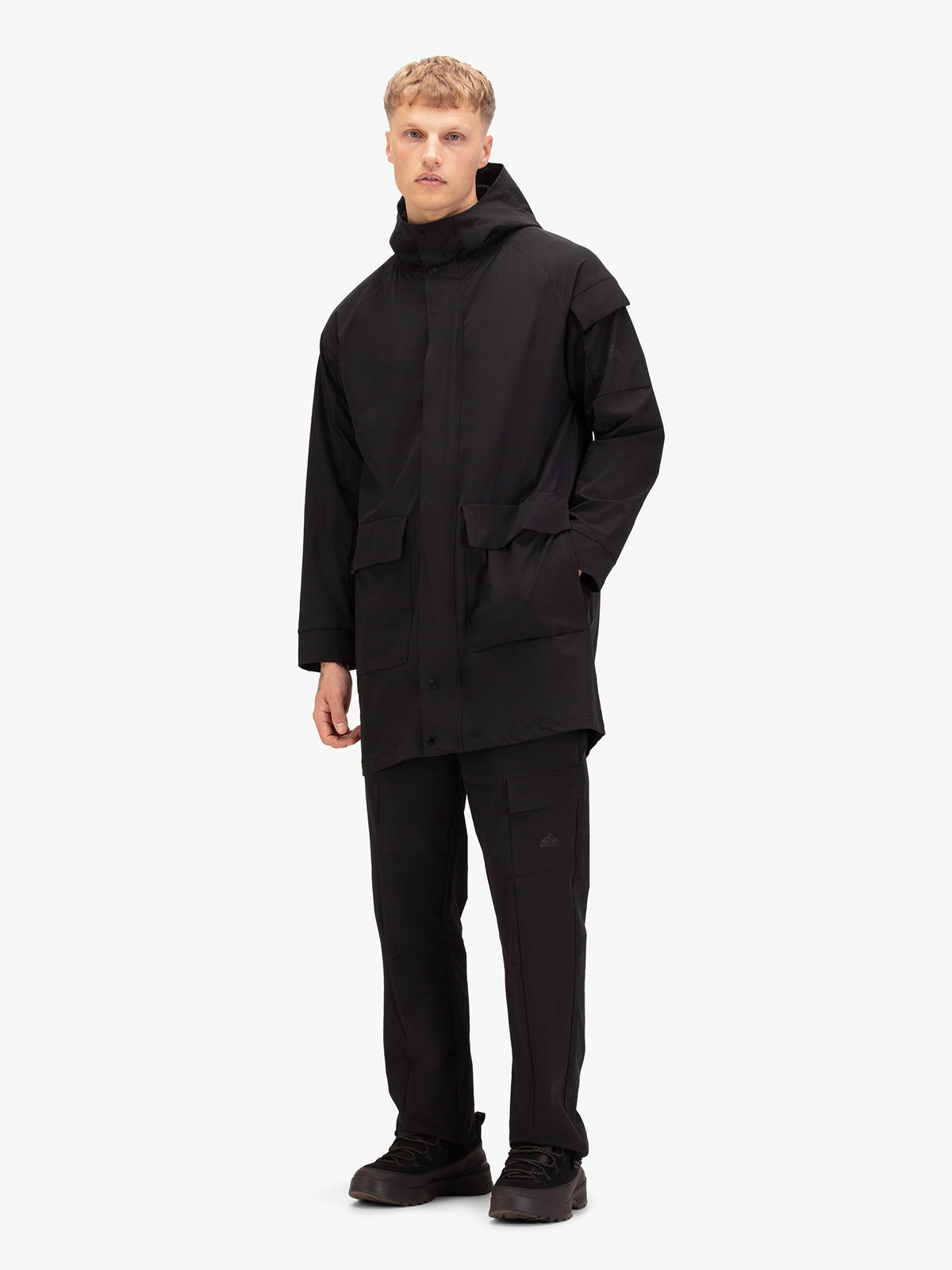 Men's black jacket with zip-up front.