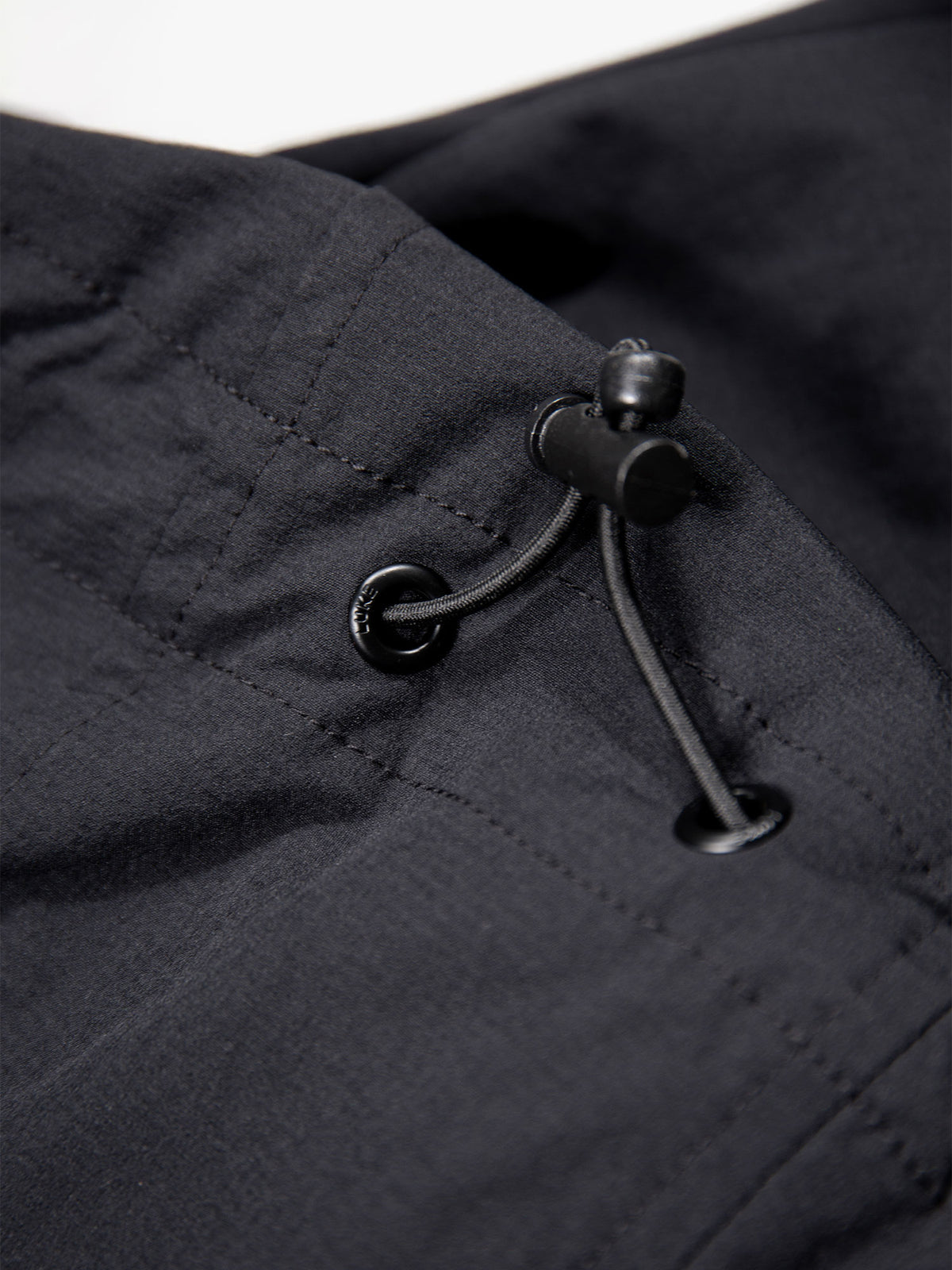 Men's black jacket with zip-up front.