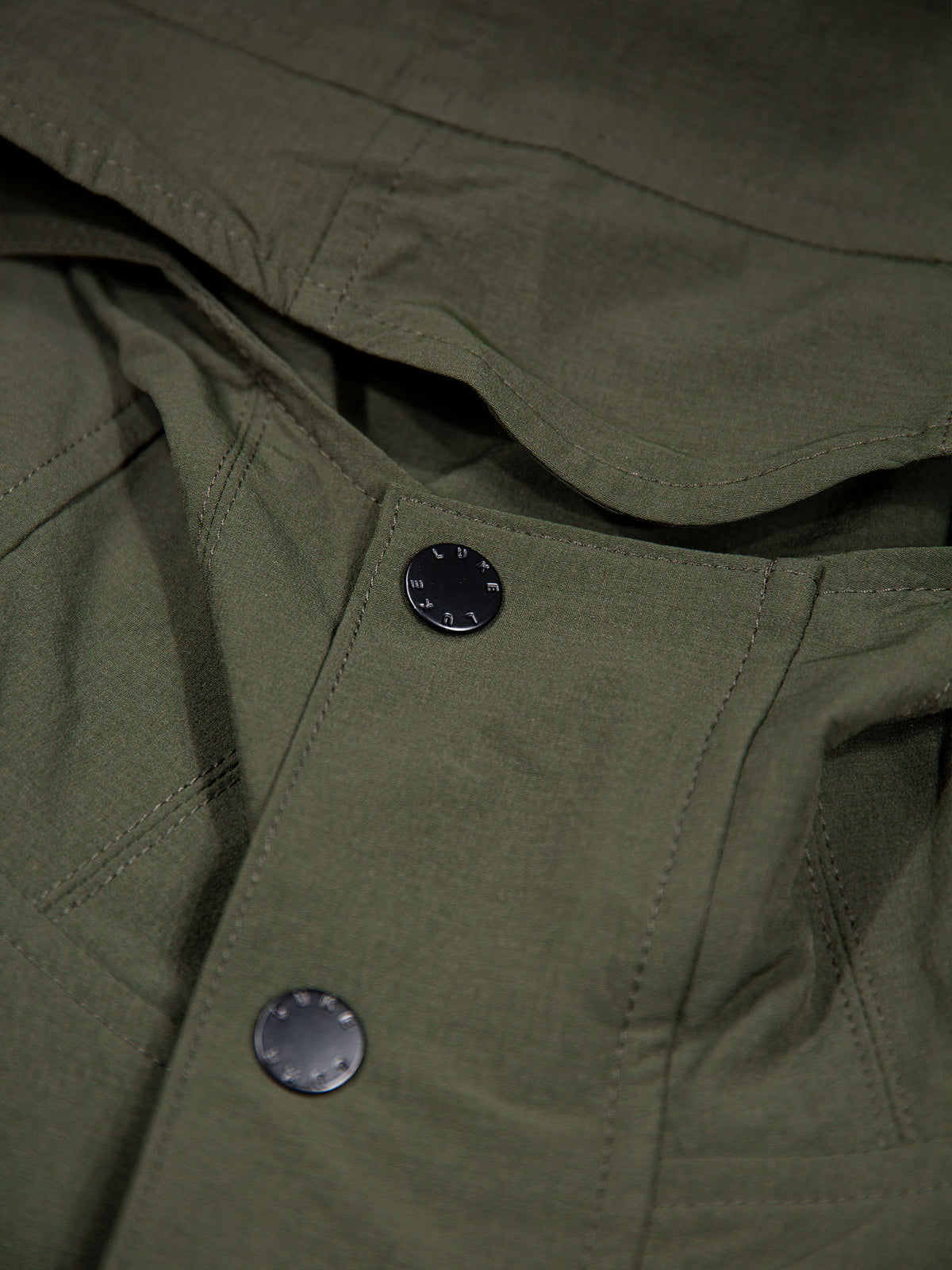 Men's green jacket with zip-up front.