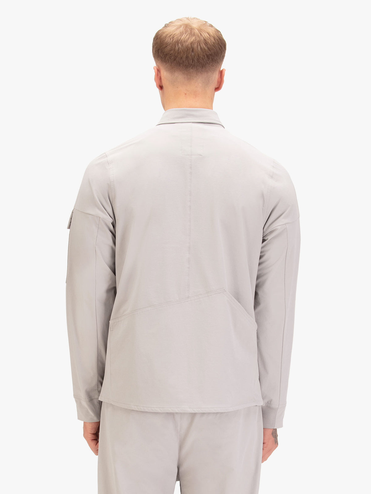 Back view of cement grey LUKE 1977 Canavese technical nylon shirt worn by model
