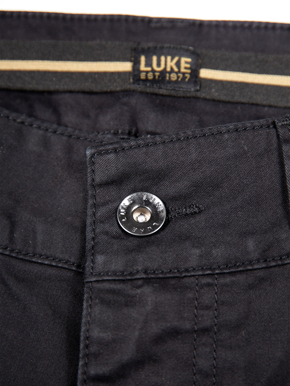 Men's black shorts with drawstring waistband and cargo pockets, detail view 1