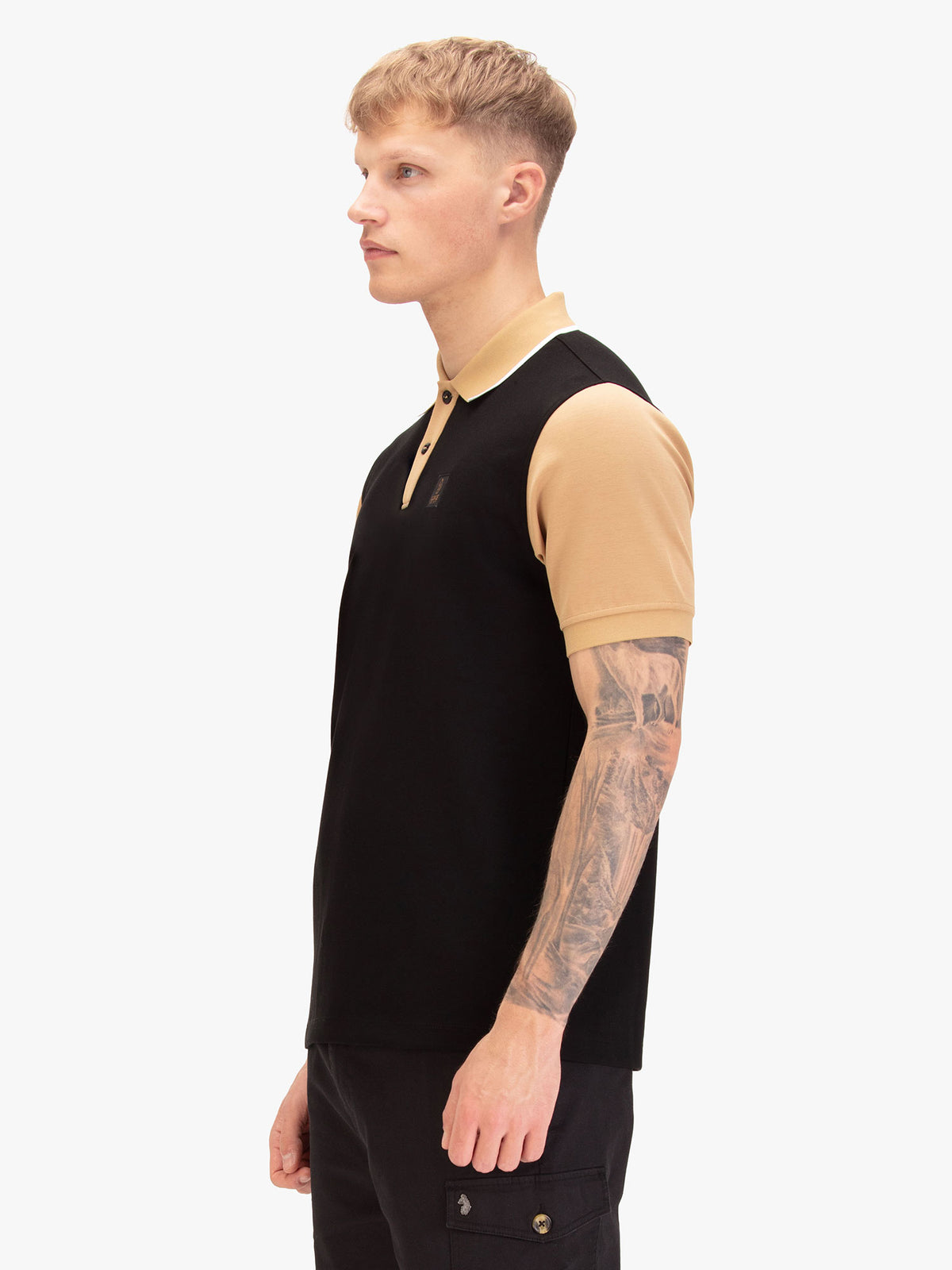 Men's black polo shirt with polo collar, back view