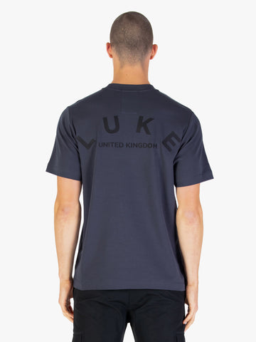 Men's relaxed-fit grey t-shirt with crew neck and short sleeves worn by a model - front view.