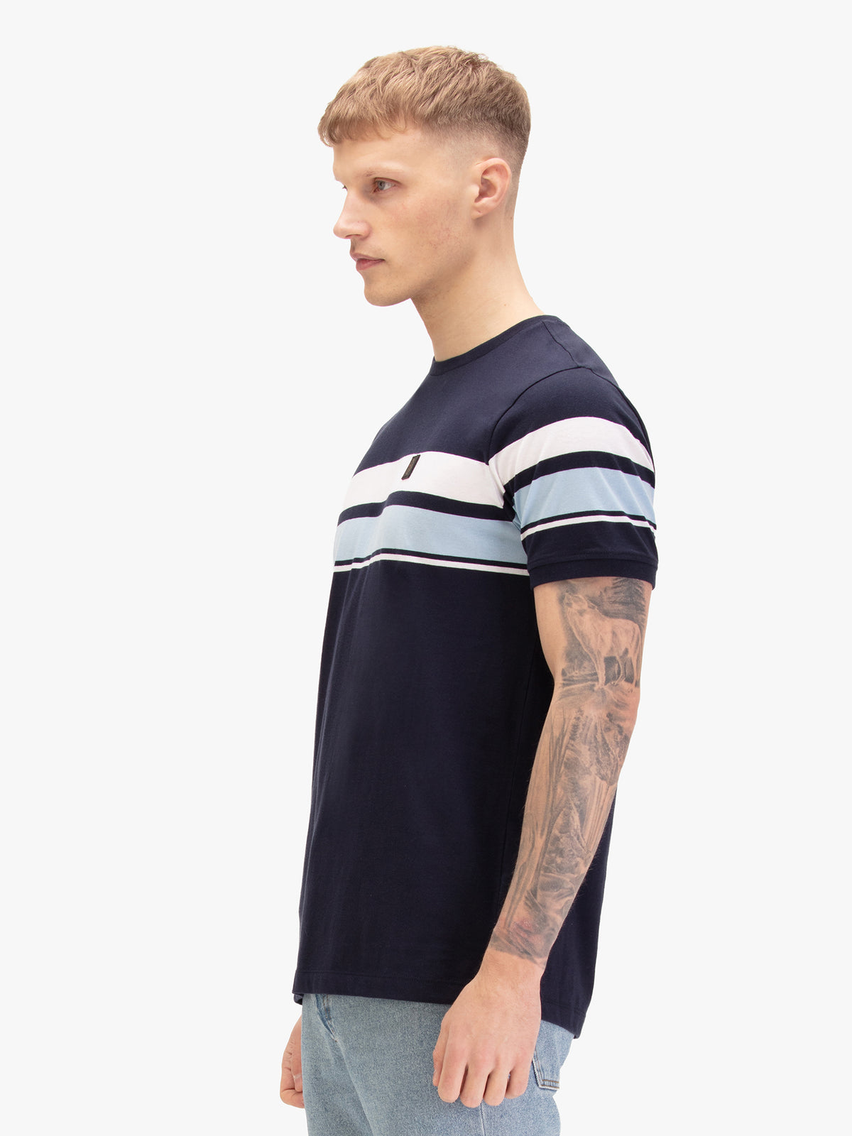 Men's navy t-shirt with crew neck and short sleeves, worn by a model, side view