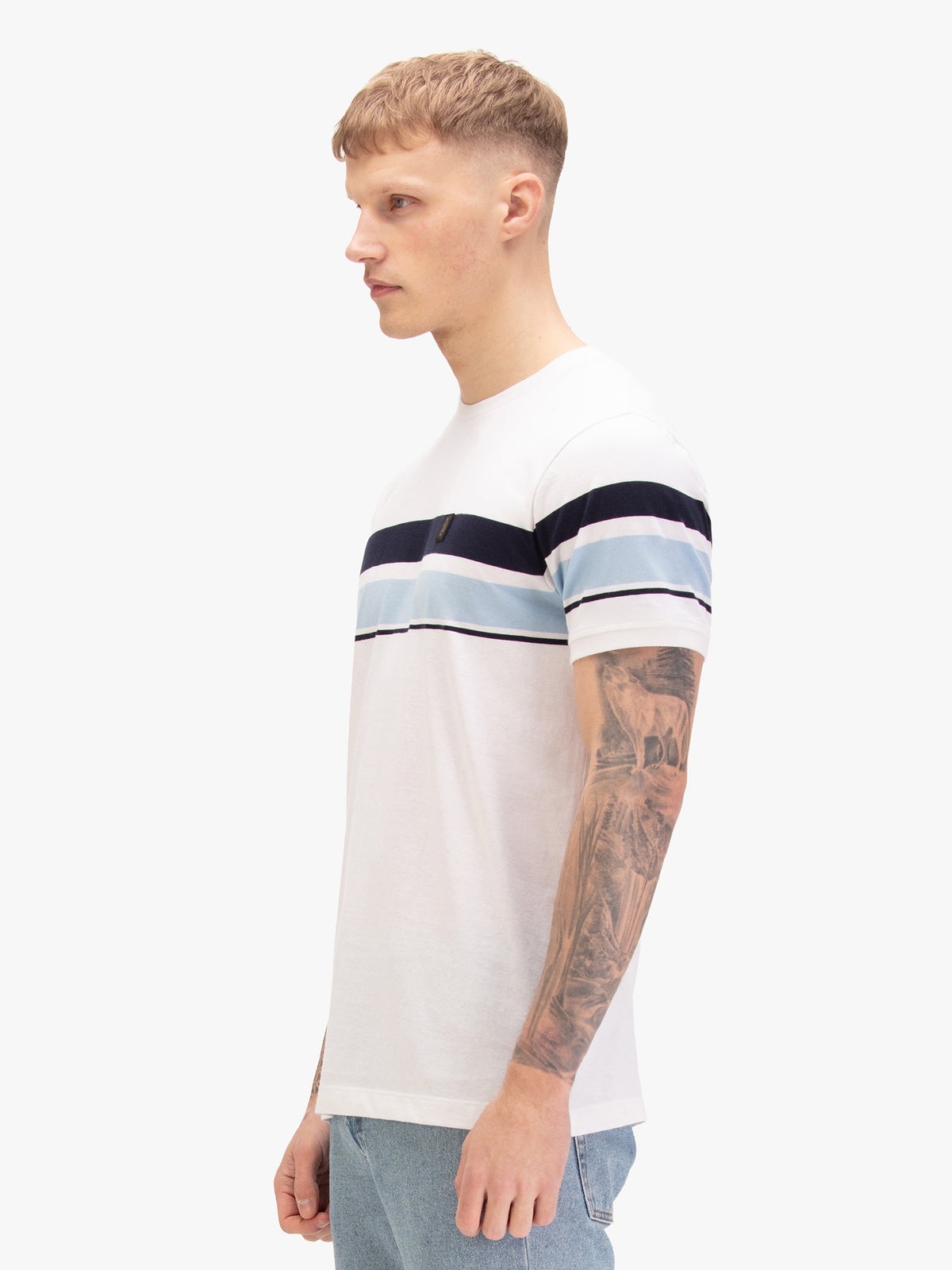 Men's white t-shirt with crew neck and short sleeves, worn by a model, side view