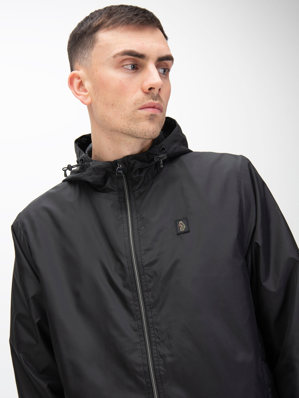 Men's black jacket with zip-up front, worn by a model