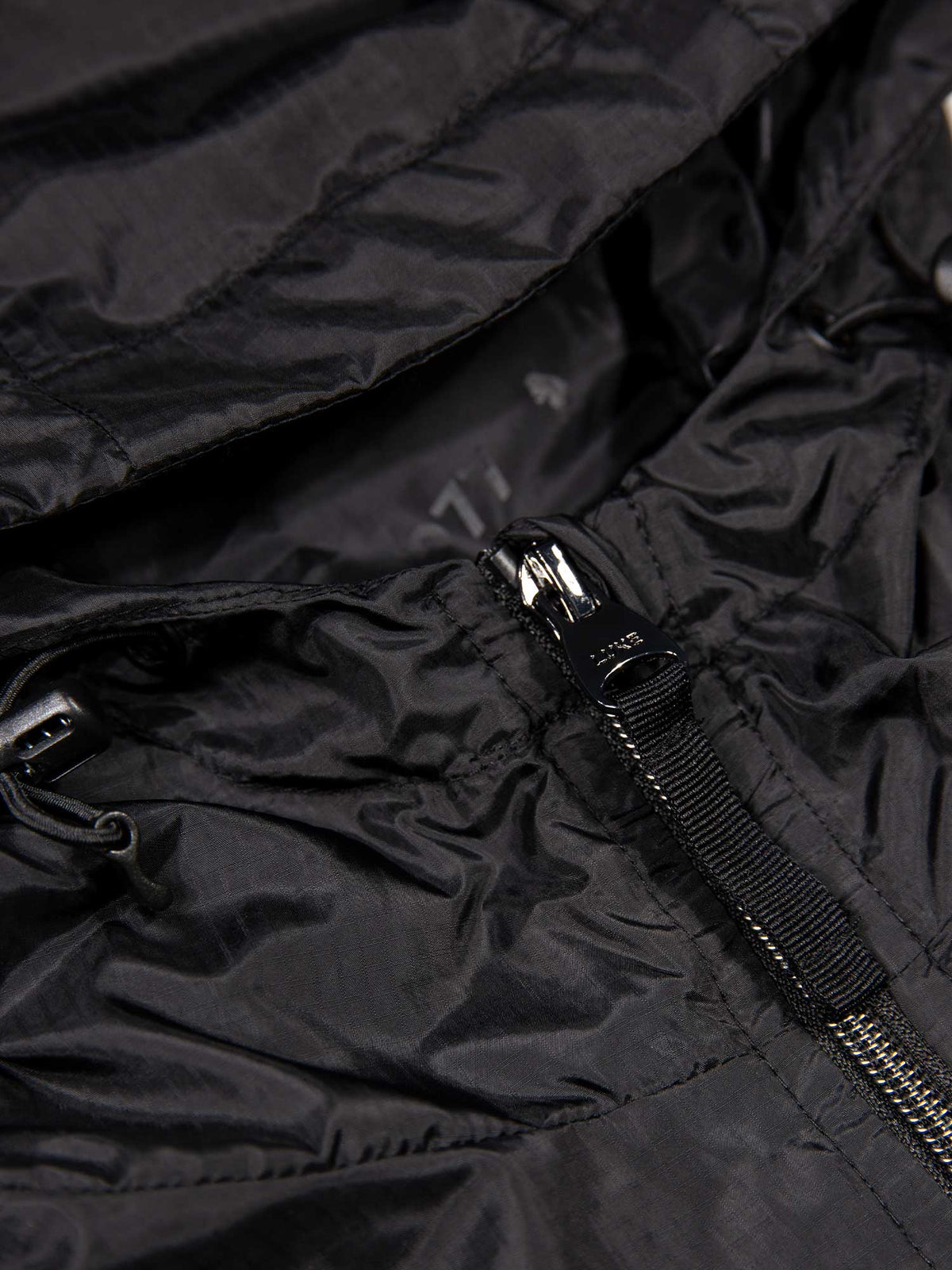 Men's black jacket with zip-up front, worn by a model, back view