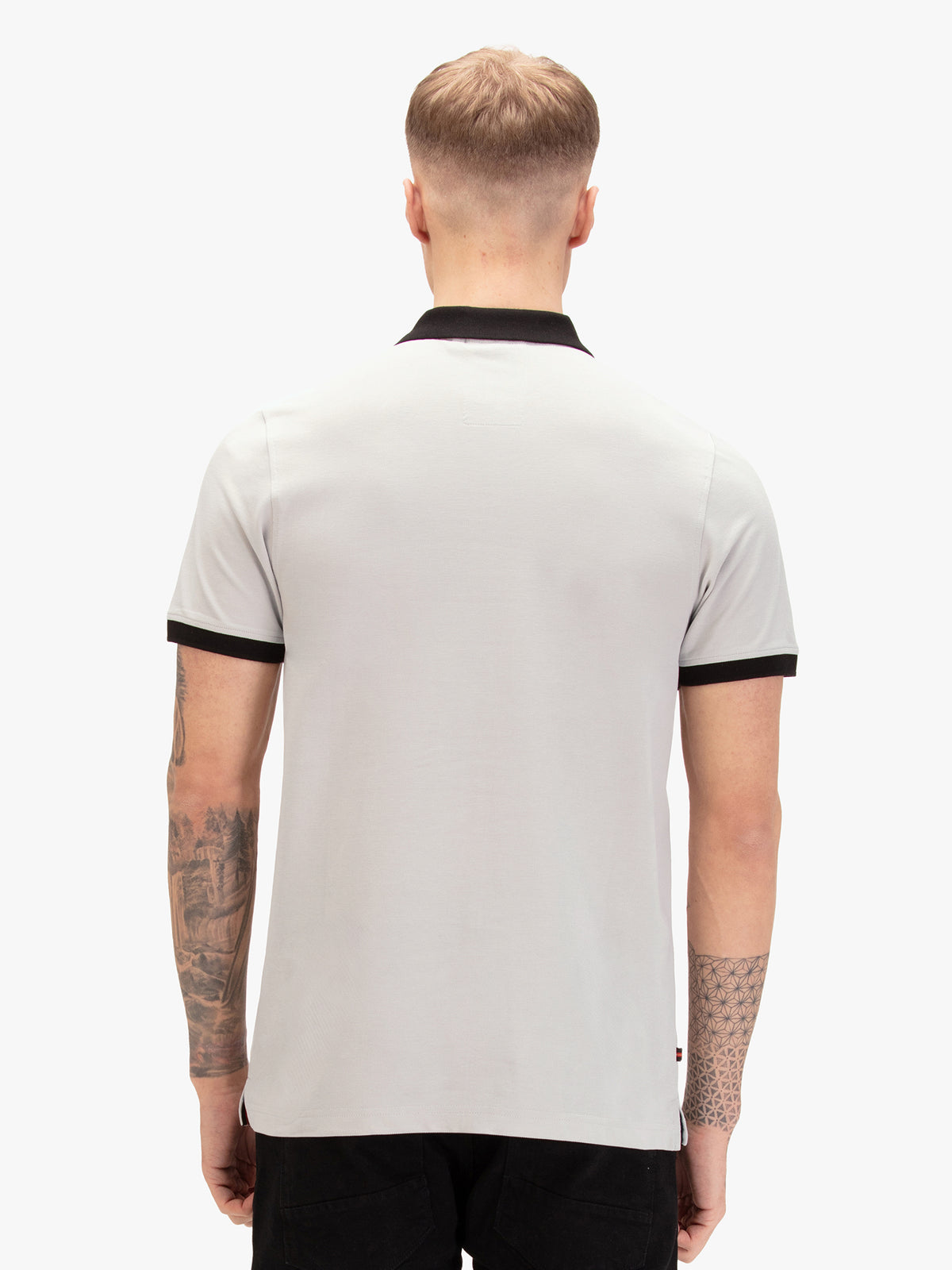 Men's grey polo shirt with polo collar, worn by a model, back view