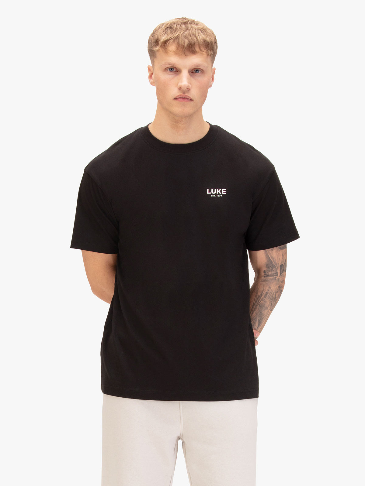 Man wearing black LUKE 1977 Exquisite relaxed fit t-shirt, front view