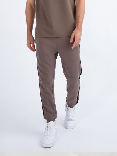 Men's brown joggers.