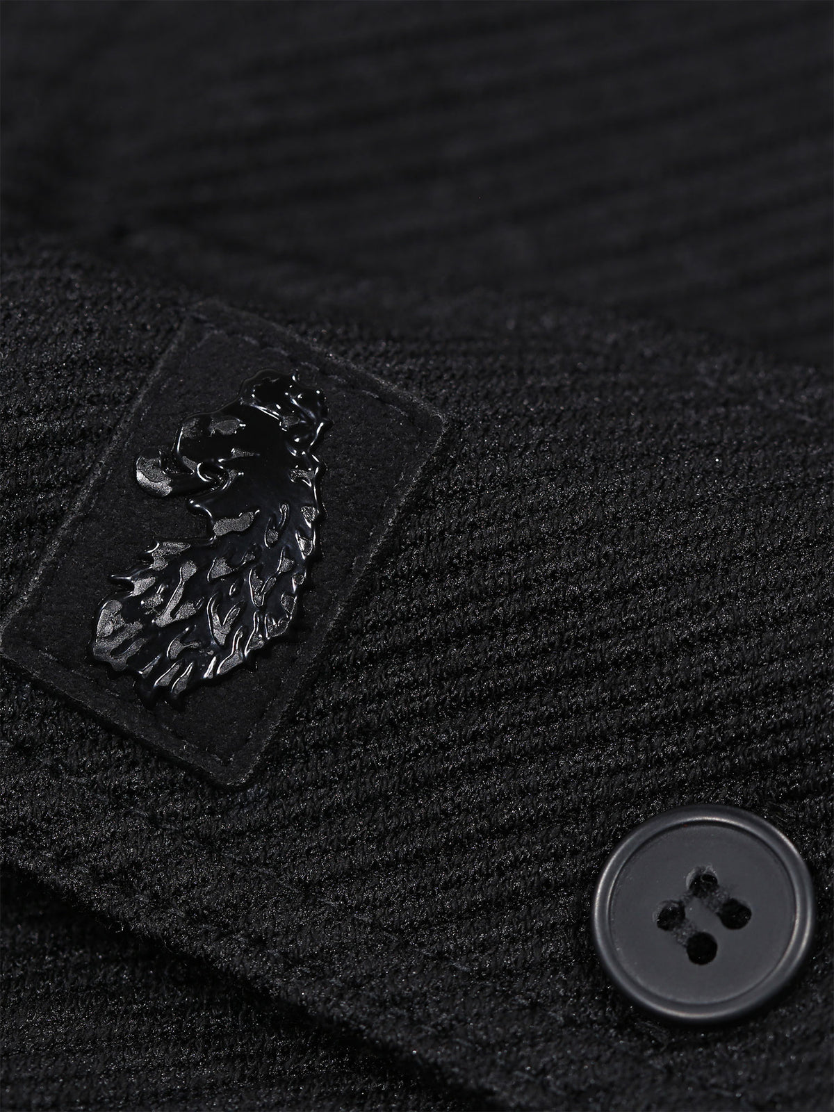 Men's black shirt with button-up front.