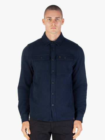 Men's navy shirt with button-up front.