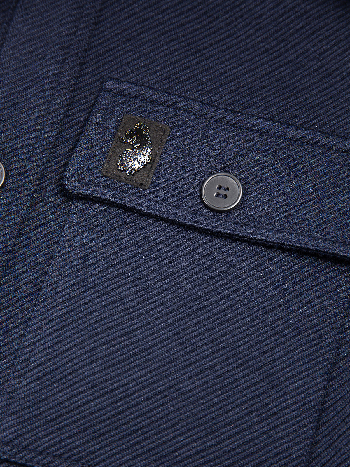 Men's navy shirt with button-up front.