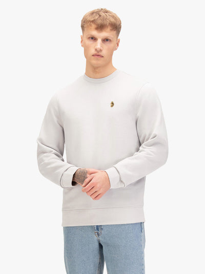 Men's grey sweatshirt with crew neck, worn by a model, front view
