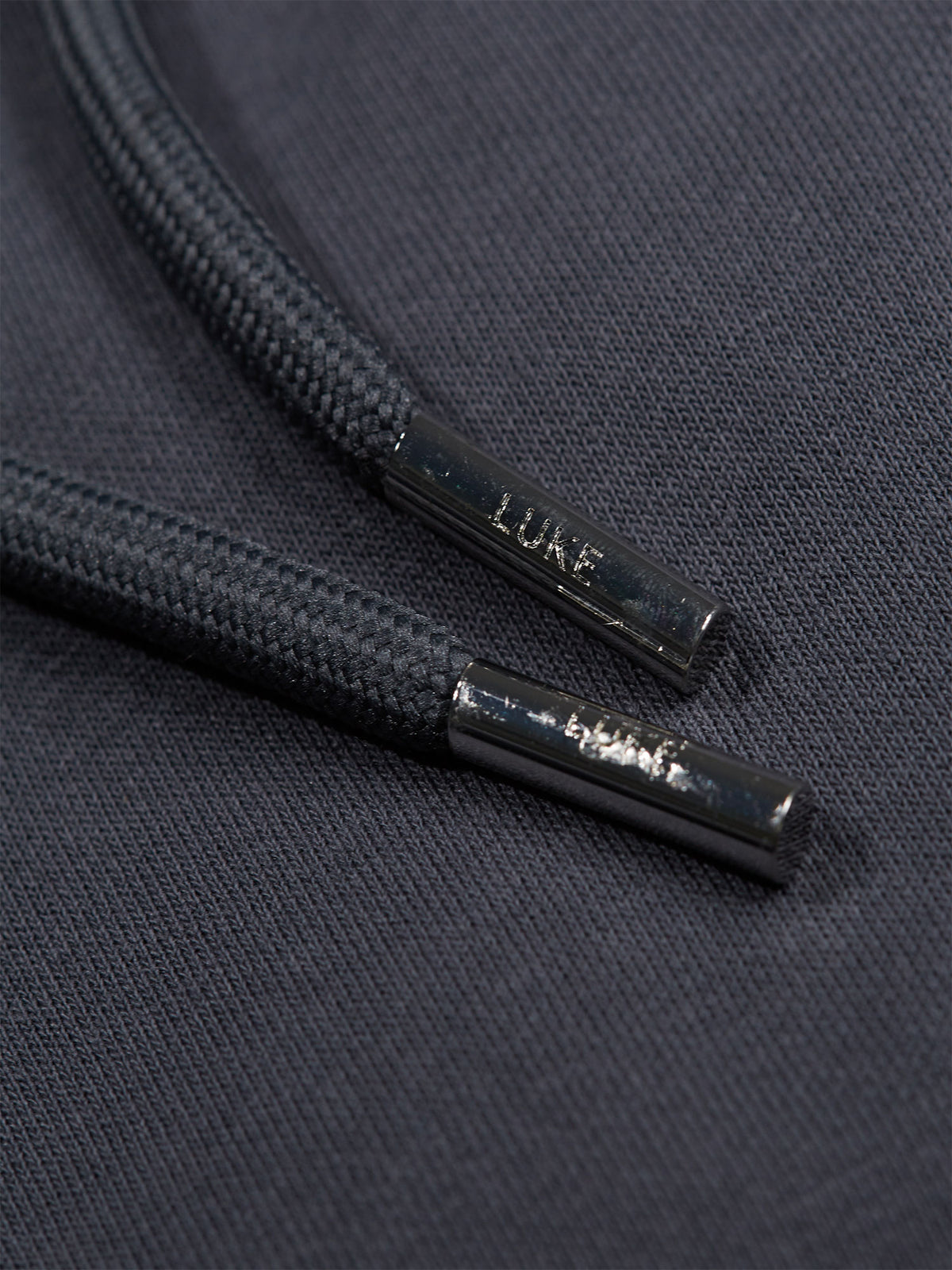 Men's grey hoodie with front pocket and drawstring hood.