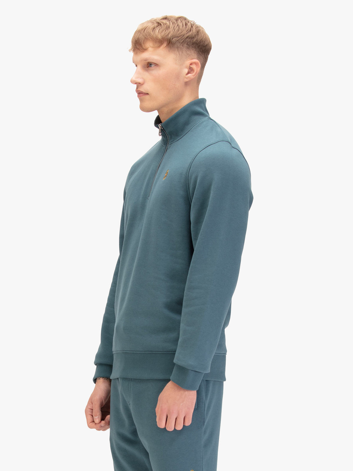 Men's blue sweatshirt with quarter-zip neck, back view