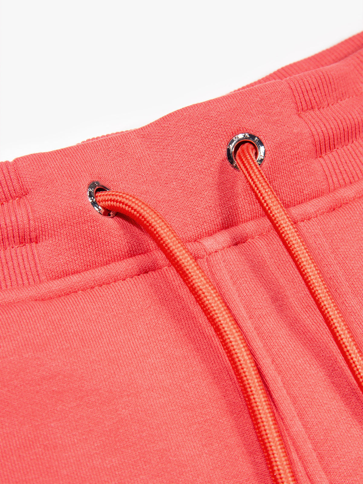 Men's red shorts with drawstring waistband, detail view 1