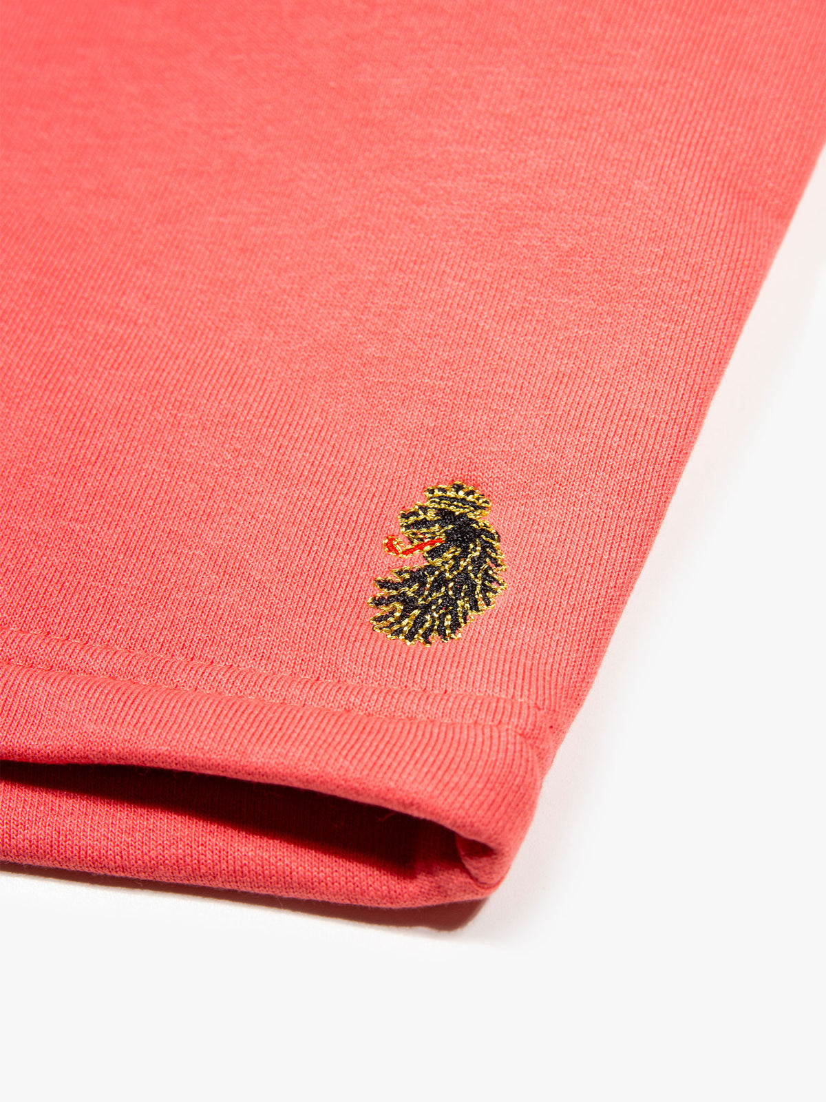 Men's red shorts with drawstring waistband, detail view 3