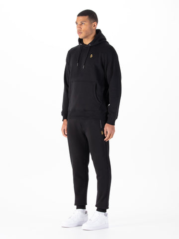 Men's black tracksuit with pullover hoodie and matching joggers.