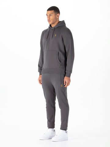 Men's grey tracksuit with pullover hoodie and matching joggers.