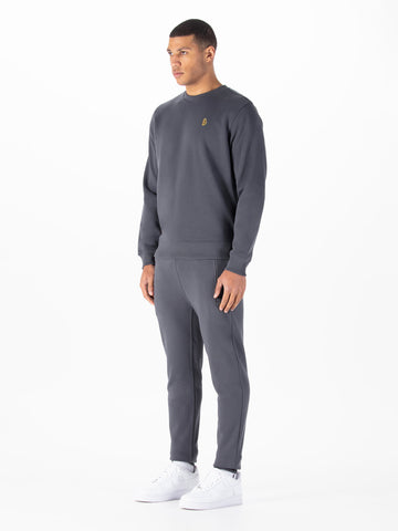 Men's grey tracksuit with crew neck sweatshirt and matching joggers.